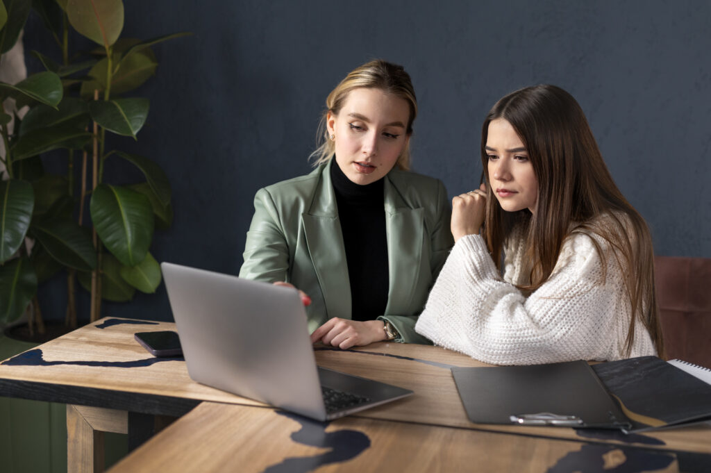 female wedding planner working with client kick digit